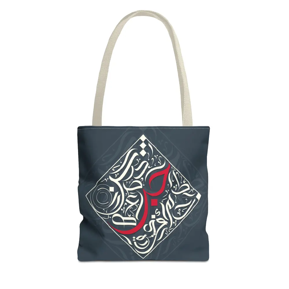 Flat lay product view of the Bedouin Love canvas tote bag featuring modern black Arabic calligraphy art on a clean background by BinMahmood.