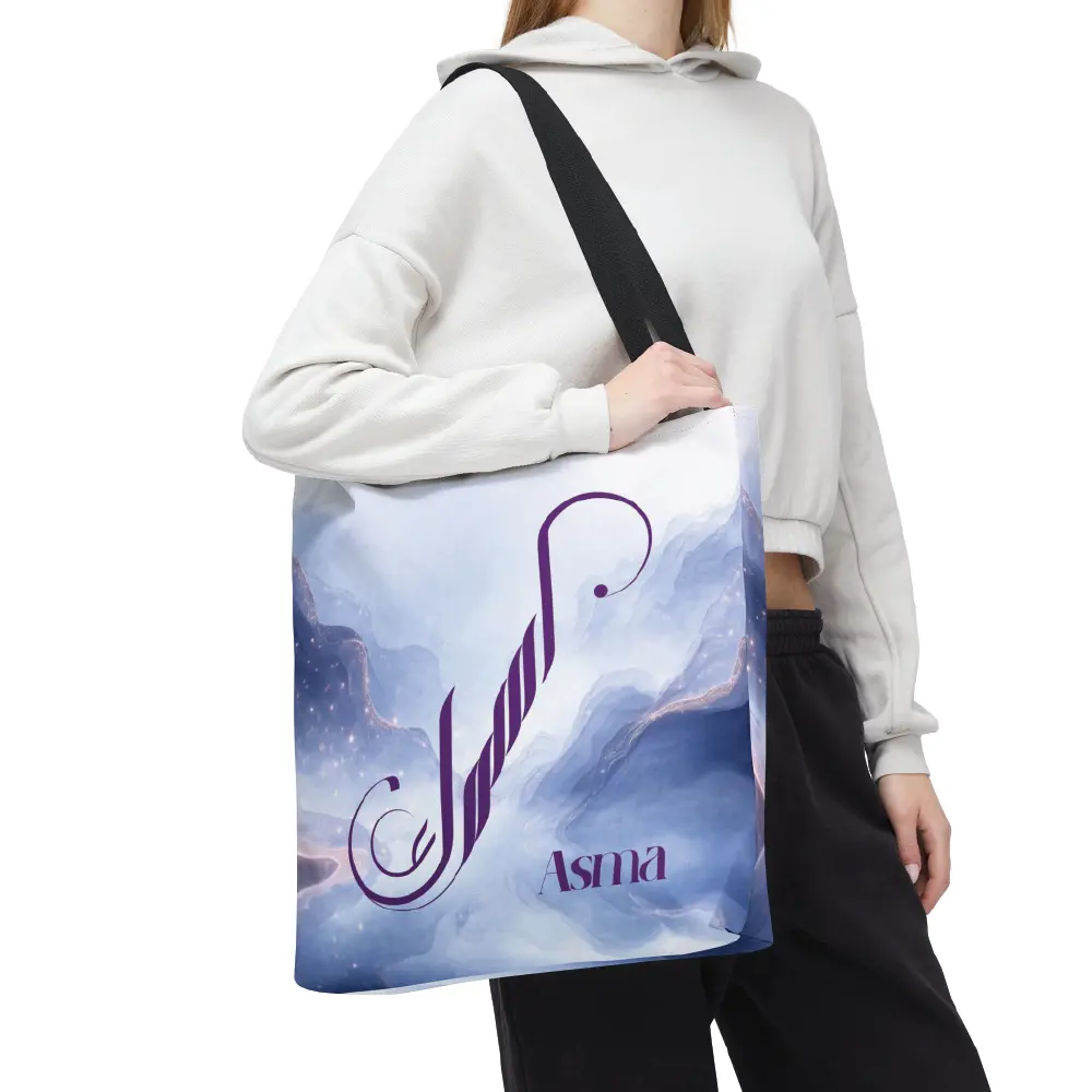 Asma name in BinMahmood original Arabic fusion calligraphy in plum purple ink on a white polyester tote bag with navy handles, marble cloud background — mouse-crafted by BinMahmood