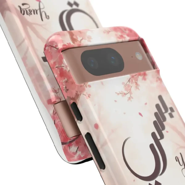Isolated front product view of the Yusra tailored dual layer tough case over a transparent background showing precise camera cutouts and full wrap glossy print by BinMahmood.