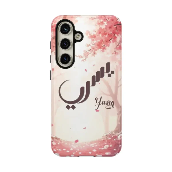 Isolated front product view of the Yusra tailored dual layer tough case over a transparent background showing precise camera cutouts and full wrap glossy print by BinMahmood.