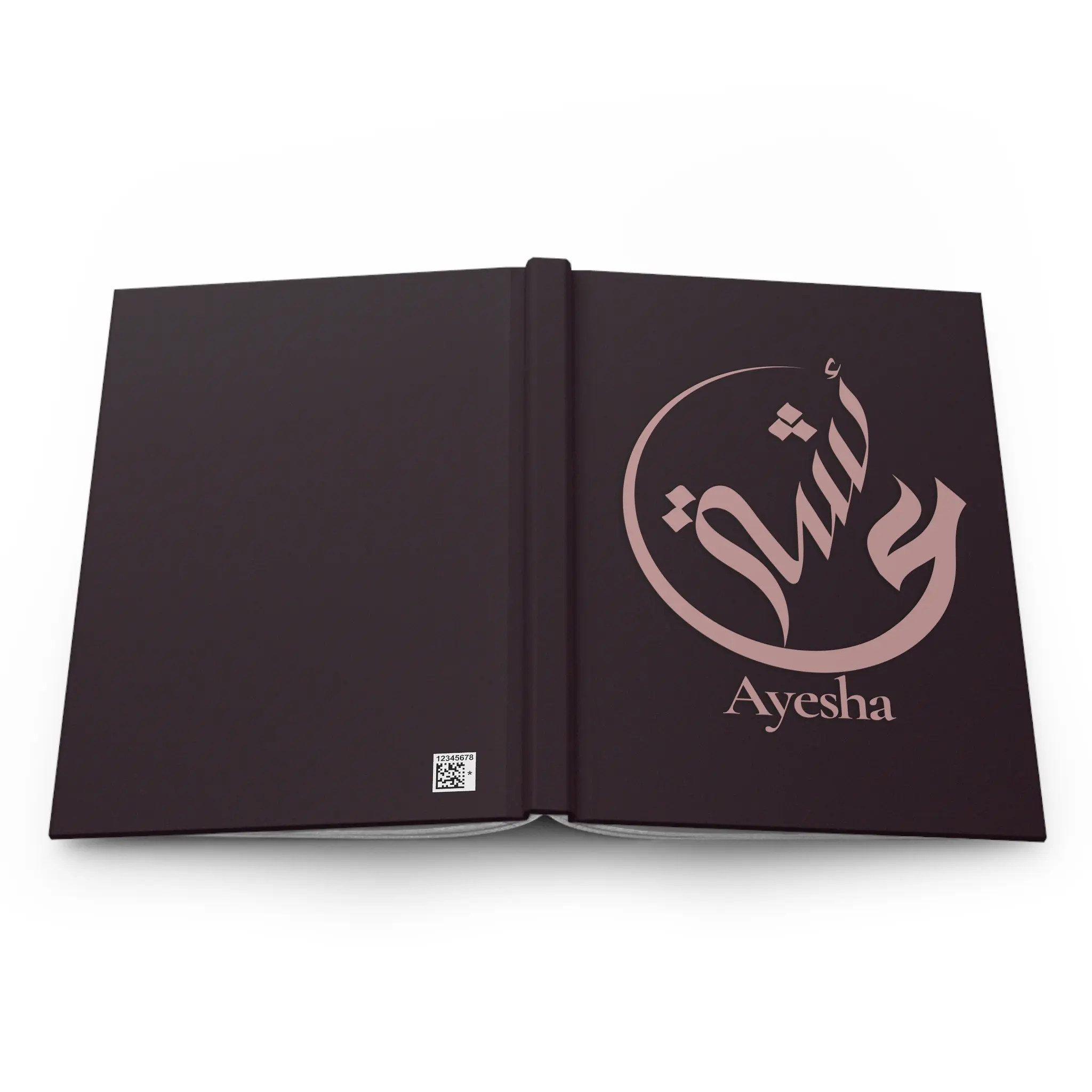 Ayesha name journal cover in plum with muted rose gold Arabic calligraphy, product mockup on white background