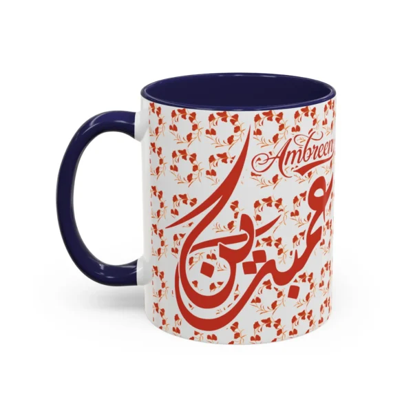 Isolated studio product shot of the Ambreen unique two tone ceramic coffee cup showing a vibrant navy rim and accent handle over a solid white background by BinMahmood.