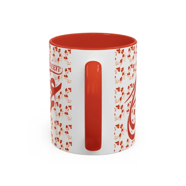 Isolated studio product shot of the Ambreen unique two tone ceramic coffee cup showing a vibrant red rim and accent handle over a solid white background by BinMahmood.