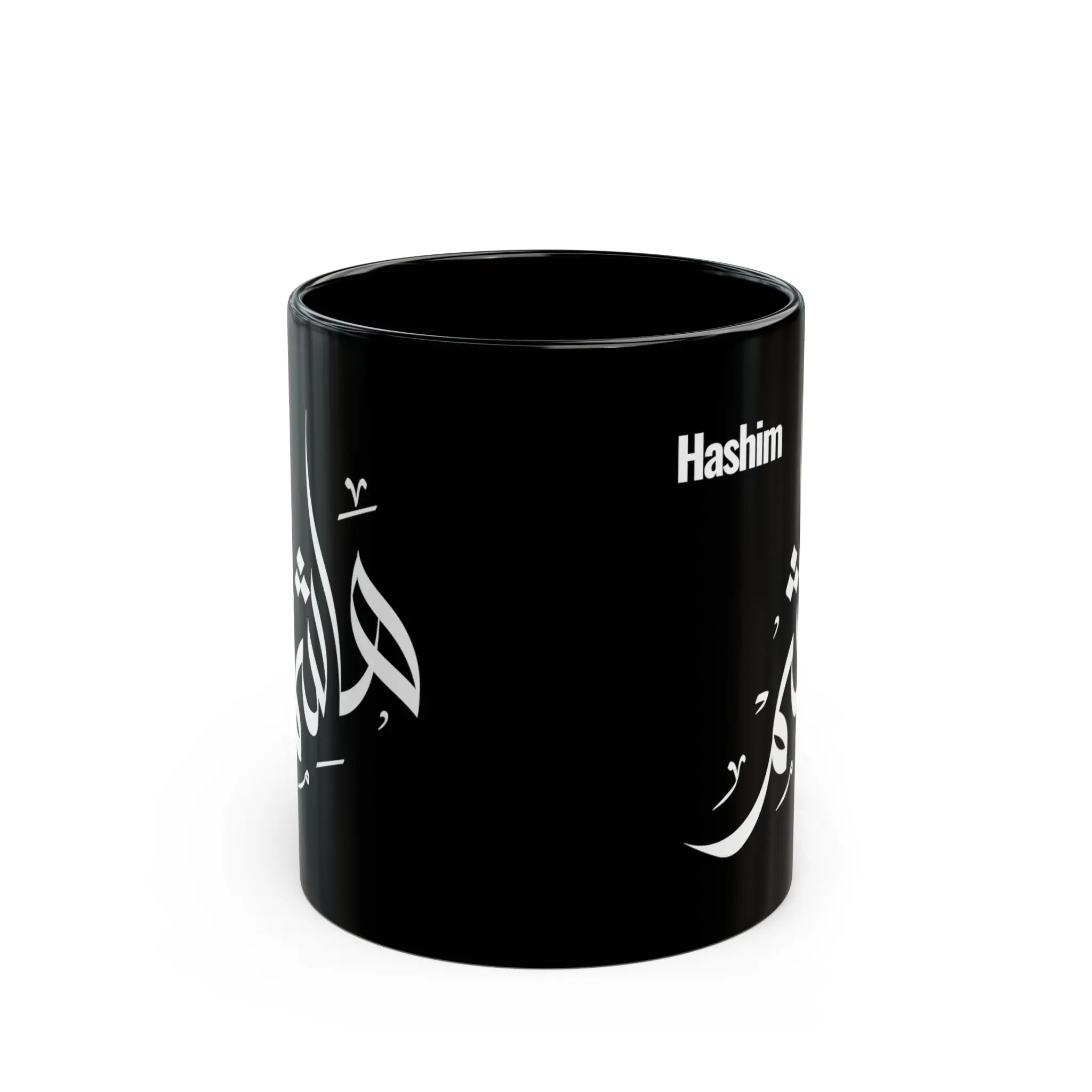 Personalized black ceramic mug with the name Hashim in Arabic calligraphy and English lettering, shown on a plain white background.
