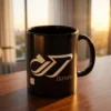 Product photography of Ikram Arabic fusion typography black mug placed on a wooden top near a window the golden hour lights highlights the calligraphy on the mug