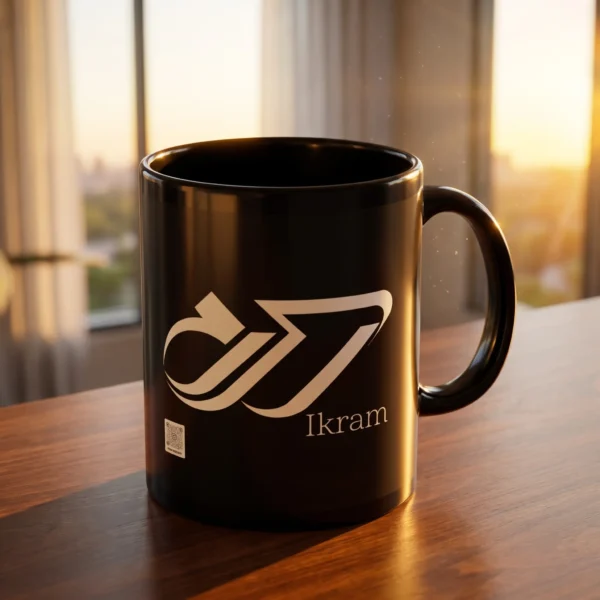 Product photography of Ikram Arabic fusion typography black mug placed on a wooden top near a window the golden hour lights highlights the calligraphy on the mug