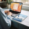 Product photography of Saba Arabic calligraphy name art spiral notebook, lay flat on an office table - binmahmood