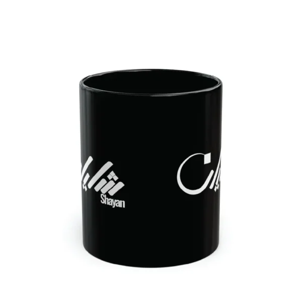 Black mug with white Arabic calligraphy “Shayan” on clean white background, personalized fusion calligraphy design by BinMahmood
