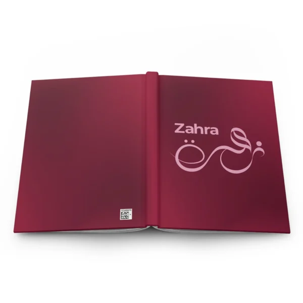 Zahra personalized Arabic calligraphy journal in burgundy with pink lettering, product photo on white background