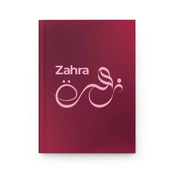 Zahra personalized Arabic calligraphy journal in burgundy with pink lettering, product photo on white background