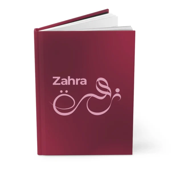 Zahra personalized Arabic calligraphy journal in burgundy with pink lettering, product photo on white background