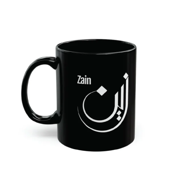 Black mug with white Arabic calligraphy “Zain” on clean white background, personalized name mug by BinMahmood